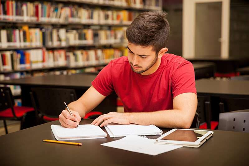 Student studying in a library